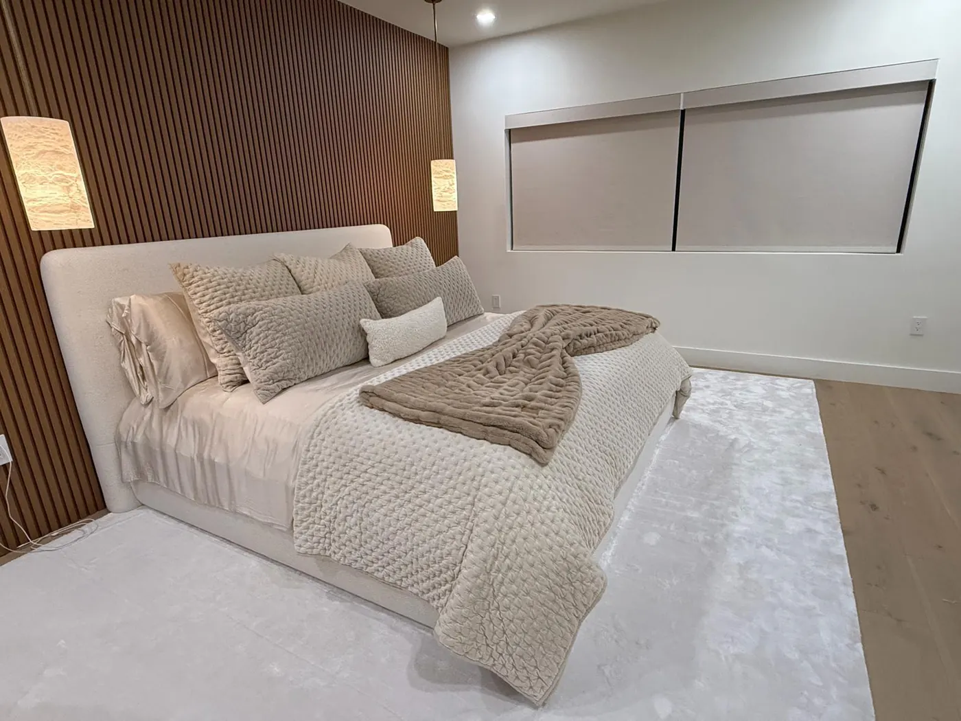 Bedroom feature wall — One Direct Mill project in South Florida