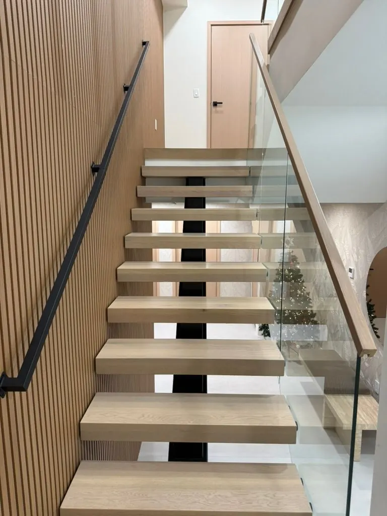Floating stairs & glass rail — One Direct Mill project in South Florida