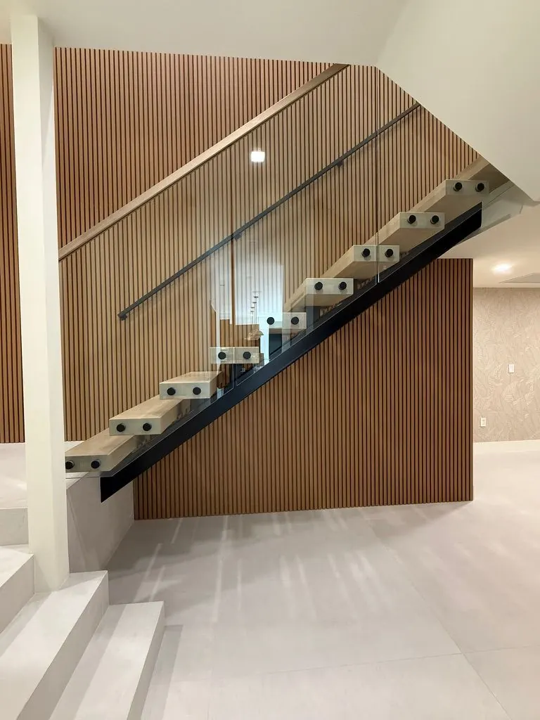 Glass-rail staircase — One Direct Mill project in South Florida